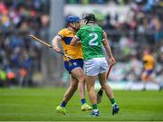 25 May 2025; Shane O'Donnell of Clare and Barry Murphy of Limerick tussle during the Munster GAA Hurling Senior Championship Round 5 match between Limerick and Clare at TUS Gaelic Grounds in Limerick. Photo by John Sheridan/Sportsfile