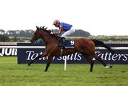 25 May 2025; Lake Victoria, with Ryan Moore up, on their way to winning the Tattersalls Irish 1,000 Guineas during day three of the Tattersalls Irish Guineas Festival at The Curragh Racecourse in Newbridge, Kildare. Photo by Thomas Doolin/Sportsfile