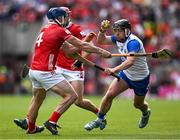 25 May 2025; Darragh Lyons of Waterford is tackled by Seán O’Donoghue of Cork during the Munster GAA Hurling Senior Championship Round 5 match between Cork and Waterford at SuperValu Páirc Ui Chaoimh in Cork. Photo by Brendan Moran/Sportsfile
