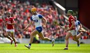 25 May 2025; Sean Walsh of Waterford races clear of Cormac O'Brien of Cork during the Munster GAA Hurling Senior Championship Round 5 match between Cork and Waterford at SuperValu Páirc Ui Chaoimh in Cork. Photo by Brendan Moran/Sportsfile