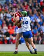 25 May 2025; Michael Kiely of Waterford and Eoin Downey of Cork tussle during the Munster GAA Hurling Senior Championship Round 5 match between Cork and Waterford at SuperValu Páirc Ui Chaoimh in Cork. Photo by Brendan Moran/Sportsfile