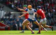 25 May 2025; Sean Walsh of Waterford is tackled by Cork players Cormac O'Brien, left, and Seán O’Donoghue during the Munster GAA Hurling Senior Championship Round 5 match between Cork and Waterford at SuperValu Páirc Ui Chaoimh in Cork. Photo by Brendan Moran/Sportsfile