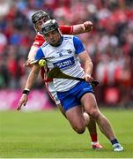 25 May 2025; Darragh Lyons of Waterford in action against Darragh Fitzgibbon of Cork during the Munster GAA Hurling Senior Championship Round 5 match between Cork and Waterford at SuperValu Páirc Ui Chaoimh in Cork. Photo by Brendan Moran/Sportsfile