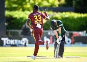25 May 2025; West Indies bowler Jayden Seales celebrates after dismissing Ireland batter Andrew Balbirnie during match three of the One Day International Series between Ireland and the West Indies at Castle Avenue Cricket Ground in Dublin. Photo by Seb Daly/Sportsfile