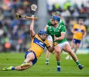 25 May 2025; Shane O'Donnell of Clare in action against Mike Casey of Limerick during the Munster GAA Hurling Senior Championship Round 5 match between Limerick and Clare at TUS Gaelic Grounds in Limerick. Photo by John Sheridan/Sportsfile