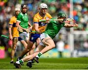 25 May 2025; William O'Donoghue of Limerick is tackled by Cian Galvin of Clare during the Munster GAA Hurling Senior Championship Round 5 match between Limerick and Clare at TUS Gaelic Grounds in Limerick. Photo by Tom Beary/Sportsfile
