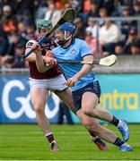 25 May 2025; Conor Donohue of Dublin is tackled by Cathal Mannion of Galway during the Leinster GAA Hurling Senior Championship Round 5 match between Dublin and Galway at Parnell Park in Dublin. Photo by Ray McManus/Sportsfile