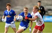 25 May 2025; Jake Brady of Cavan in action against Peter Colton of Tyrone during the Electric Ireland Ulster GAA Football Minor Championship final match between Cavan and Tyrone at Brewster Park in Enniskillen, Fermanagh. Photo by Oliver McVeigh/Sportsfile