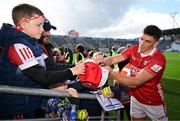25 May 2025; Ciarán Joyce of Cork signs autographs after his side's victory in the Munster GAA Hurling Senior Championship Round 5 match between Cork and Waterford at SuperValu Páirc Ui Chaoimh in Cork. Photo by Brendan Moran/Sportsfile