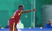25 May 2025; West Indies bowler Alzarri Joseph celebrates after claiming the wicket of Ireland batter Lorcan Tucker of during match three of the One Day International Series between Ireland and the West Indies at Castle Avenue Cricket Ground in Dublin. Photo by Seb Daly/Sportsfile
