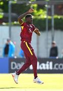 25 May 2025; West Indies bowler Alzarri Joseph celebrates after claiming the wicket of Ireland batter Lorcan Tucker of during match three of the One Day International Series between Ireland and the West Indies at Castle Avenue Cricket Ground in Dublin. Photo by Seb Daly/Sportsfile
