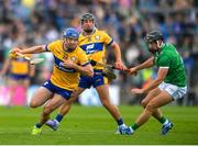 25 May 2025; Shane O'Donnell of Clare in action against Barry Murphy of Limerick during the Munster GAA Hurling Senior Championship Round 5 match between Limerick and Clare at TUS Gaelic Grounds in Limerick. Photo by John Sheridan/Sportsfile