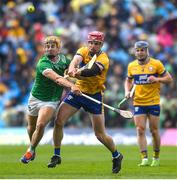 25 May 2025; John Conlon of Clare in action against Adam English of Limerick during the Munster GAA Hurling Senior Championship Round 5 match between Limerick and Clare at TUS Gaelic Grounds in Limerick. Photo by John Sheridan/Sportsfile