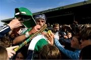 25 May 2025; David Reidy of Limerick signs his autograph on a hurley after the Munster GAA Hurling Senior Championship Round 5 match between Limerick and Clare at TUS Gaelic Grounds in Limerick. Photo by Tom Beary/Sportsfile