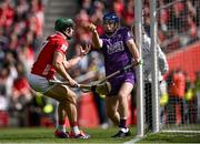 25 May 2025; Cork goalkeeper Patrick Collins catches the ball near his own end line, supported by team-mate Mark Coleman during the Munster GAA Hurling Senior Championship Round 5 match between Cork and Waterford at SuperValu Páirc Ui Chaoimh in Cork. Photo by Piaras Ó Mídheach/Sportsfile
