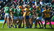 25 May 2025; Clare and Limerick players tussle during the Munster GAA Hurling Senior Championship Round 5 match between Limerick and Clare at TUS Gaelic Grounds in Limerick. Photo by John Sheridan/Sportsfile