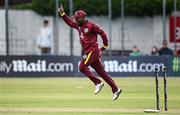 25 May 2025; Evin Lewis of West Indies celebrates after running-out Ireland batter Andrew McBrine, not pictured, to claim victory for his side in match three of the One Day International Series between Ireland and the West Indies at Castle Avenue Cricket Ground in Dublin. Photo by Seb Daly/Sportsfile