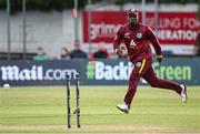 25 May 2025; Evin Lewis of West Indies runs-out Ireland batter Andrew McBrine, not pictured, to claim victory for his side in match three of the One Day International Series between Ireland and the West Indies at Castle Avenue Cricket Ground in Dublin. Photo by Seb Daly/Sportsfile
