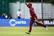 25 May 2025; Evin Lewis of West Indies celebrates after running-out Ireland batter Andrew McBrine, not pictured, to claim victory for his side in match three of the One Day International Series between Ireland and the West Indies at Castle Avenue Cricket Ground in Dublin. Photo by Seb Daly/Sportsfile