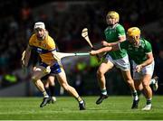 25 May 2025; Ryan Taylor of Clare is tackled by Tom Morrissey of Limerick during the Munster GAA Hurling Senior Championship Round 5 match between Limerick and Clare at TUS Gaelic Grounds in Limerick. Photo by Tom Beary/Sportsfile