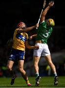 25 May 2025; Dan Morrissey of Limerick in action against Peter Duggan of Clare during the Munster GAA Hurling Senior Championship Round 5 match between Limerick and Clare at TUS Gaelic Grounds in Limerick. Photo by Tom Beary/Sportsfile