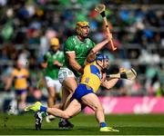 25 May 2025; Shane O'Donnell of Clare is tackled by Dan Morrissey of Limerick during the Munster GAA Hurling Senior Championship Round 5 match between Limerick and Clare at TUS Gaelic Grounds in Limerick. Photo by Tom Beary/Sportsfile