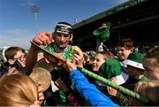 25 May 2025; Gearóid Hegarty of Limerick signs hurls for young supporters after the Munster GAA Hurling Senior Championship Round 5 match between Limerick and Clare at TUS Gaelic Grounds in Limerick. Photo by Tom Beary/Sportsfile