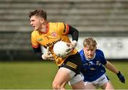 25 May 2025; Ronan Donnelly of Tyrone in action against Mark Reilly of Cavan during the Electric Ireland Ulster GAA Football Minor Championship final match between Cavan and Tyrone at Brewster Park in Enniskillen, Fermanagh. Photo by Oliver McVeigh/Sportsfile