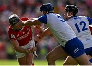 25 May 2025; Darragh Fitzgibbon of Cork has his helmet grabbed by Conor Prunty of Waterford during the Munster GAA Hurling Senior Championship Round 5 match between Cork and Waterford at SuperValu Páirc Ui Chaoimh in Cork. Photo by Brendan Moran/Sportsfile