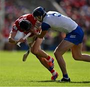 25 May 2025; Darragh Fitzgibbon of Cork has his helmet grabbed by Conor Prunty of Waterford during the Munster GAA Hurling Senior Championship Round 5 match between Cork and Waterford at SuperValu Páirc Ui Chaoimh in Cork. Photo by Brendan Moran/Sportsfile