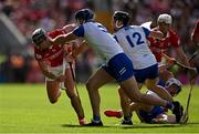 25 May 2025; Darragh Fitzgibbon of Cork has his helmet grabbed by Conor Prunty of Waterford during the Munster GAA Hurling Senior Championship Round 5 match between Cork and Waterford at SuperValu Páirc Ui Chaoimh in Cork. Photo by Brendan Moran/Sportsfile