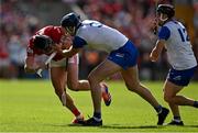25 May 2025; Darragh Fitzgibbon of Cork has his helmet grabbed by Conor Prunty of Waterford during the Munster GAA Hurling Senior Championship Round 5 match between Cork and Waterford at SuperValu Páirc Ui Chaoimh in Cork. Photo by Brendan Moran/Sportsfile