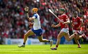 25 May 2025; Sean Walsh of Waterford in action against Cormac O'Brien of Cork during the Munster GAA Hurling Senior Championship Round 5 match between Cork and Waterford at SuperValu Páirc Ui Chaoimh in Cork. Photo by Brendan Moran/Sportsfile