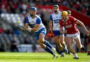 25 May 2025; Paddy Leavey of Waterford in action against Shane Barrett of Cork during the Munster GAA Hurling Senior Championship Round 5 match between Cork and Waterford at SuperValu Páirc Ui Chaoimh in Cork. Photo by Brendan Moran/Sportsfile