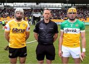 25 May 2025; Referee Michael Kennedy with team captains Paddy Burke of Antrim, left, and Ciaran Burke of Offaly before the Leinster GAA Hurling Senior Championship Round 5 match between Offaly and Antrim at Glenisk O’Connor Park in Tullamore, Offaly. Photo by Michael P Ryan/Sportsfile