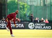 25 May 2025; West Indies bowler Roston Chase during match three of the One Day International Series between Ireland and the West Indies at Castle Avenue Cricket Ground in Dublin. Photo by Seb Daly/Sportsfile