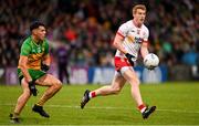 24 May 2025; Peter Harte of Tyrone in action against Odhran McFadden Ferry of Donegal during the GAA Football All-Ireland Senior Championship Round 1 match between Donegal and Tyrone at MacCumhaill Park in Ballybofey, Donegal. Photo by Ramsey Cardy/Sportsfile