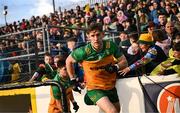 24 May 2025; Hugh McFadden of Donegal runs out for the second half of the GAA Football All-Ireland Senior Championship Round 1 match between Donegal and Tyrone at MacCumhaill Park in Ballybofey, Donegal. Photo by Ramsey Cardy/Sportsfile