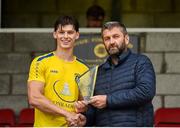 24 May 2025; FAI vice-president John Finnegan presents the player of the match award to Jason Cross of Fairview Rangers after the FAI Junior Cup final match between Fairview Rangers and North End United at Turner's Cross in Cork. Photo by Tom Beary/Sportsfile