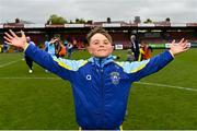 24 May 2025; A young Fairview Rangers supporter celebrates after the FAI Junior Cup final match between Fairview Rangers and North End United at Turner's Cross in Cork. Photo by Tom Beary/Sportsfile