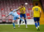 24 May 2025; Jake Dillon of Fairview Rangers in action against John Peare of North End United’during the FAI Junior Cup final match between Fairview Rangers and North End United at Turner's Cross in Cork. Photo by Tom Beary/Sportsfile