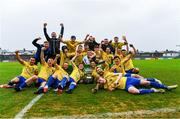24 May 2025; Fairview Rangers players and management team celebrate with the cup after the FAI Junior Cup final match between Fairview Rangers and North End United at Turner's Cross in Cork. Photo by Tom Beary/Sportsfile