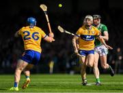 25 May 2025; Ryan Taylor of Clare in action against Declan Hannon of Limerick during the Munster GAA Hurling Senior Championship Round 5 match between Limerick and Clare at TUS Gaelic Grounds in Limerick. Photo by Tom Beary/Sportsfile