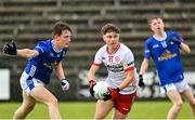 25 May 2025;Joel Kerr of Tyrone in action against Sam Maguire od Cavan during the Electric Ireland Ulster GAA Football Minor Championship final match between Cavan and Tyrone at Brewster Park in Enniskillen, Fermanagh. Photo by Oliver McVeigh/Sportsfile