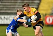 25 May 2025; Ronan Donnelly of Dungannon in action against Mark Reilly of Cavan during the Electric Ireland Ulster GAA Football Minor Championship final match between Cavan and Tyrone at Brewster Park in Enniskillen, Fermanagh. Photo by Oliver McVeigh/Sportsfile