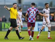 23 May 2025; Luke Heeney of Drogheda United remonstrates with referee Declan Toland after he showed a yellow card to team-mate Ryan Brennan, not pictured, during the SSE Airtricity Men's Premier Division match between Drogheda United and Bohemians at Sullivan & Lambe Park in Drogheda, Louth. Photo by Shauna Clinton/Sportsfile
