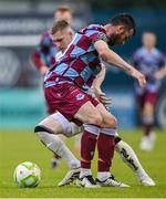 23 May 2025; Ross Tierney of Bohemians is tackled by Ryan Brennan of Drogheda United during the SSE Airtricity Men's Premier Division match between Drogheda United and Bohemians at Sullivan & Lambe Park in Drogheda, Louth. Photo by Shauna Clinton/Sportsfile