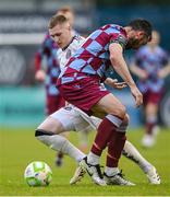 23 May 2025; Ross Tierney of Bohemians is tackled by Ryan Brennan of Drogheda United during the SSE Airtricity Men's Premier Division match between Drogheda United and Bohemians at Sullivan & Lambe Park in Drogheda, Louth. Photo by Shauna Clinton/Sportsfile