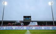 23 May 2025; Drogheda United supporters hold up a sign in support of Kneecap member Mo Chara, formally known as Liam Óg Ó hAnnaidh, before the SSE Airtricity Men's Premier Division match between Drogheda United and Bohemians at Sullivan & Lambe Park in Drogheda, Louth. Photo by Shauna Clinton/Sportsfile