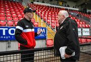 23 May 2025; Former Republic of Ireland and Derry City player James McClean with Derry City media officer Lawrence Moore before the SSE Airtricity Men's Premier Division match between Derry City and Shamrock Rovers at The Ryan McBride Brandywell Stadium in Derry. Photo by Stephen McCarthy/Sportsfile